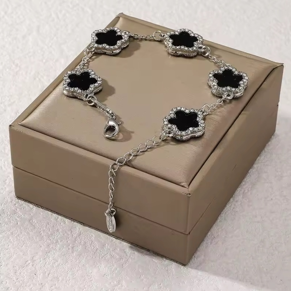 Adjustable 7-8.5 Inches Silver Tone black Clover bracelet with cubic zirconia